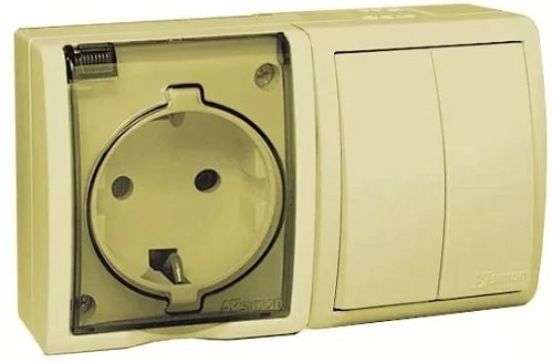

Блок Simon 1594515-031 Aqua Бежевый, розетка 2P+E Schuko 16А 250В + выкл.двойной 10А 250В, IP54, 1594515-031