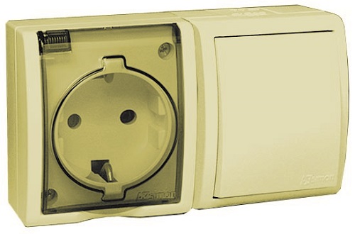 

Блок Simon 1594516-031 Aqua Бежевый, розетка 2P+E Schuko 16А 250В + выкл.проход.10А 250В, IP54, 1594516-031